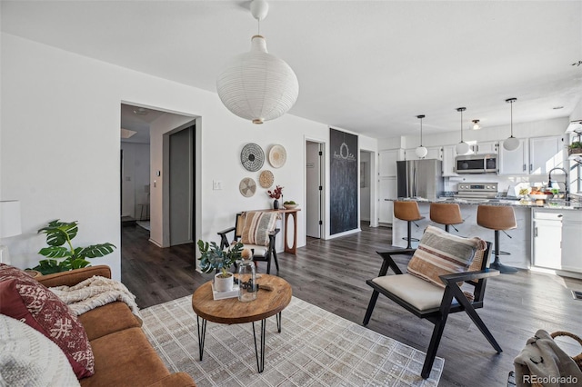 living room featuring dark hardwood / wood-style floors