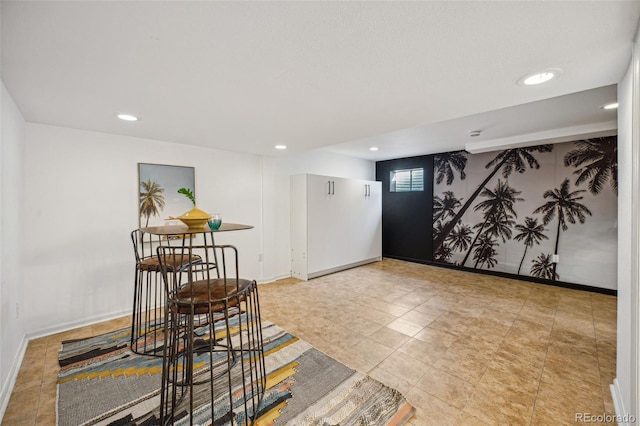 living area with light tile patterned flooring