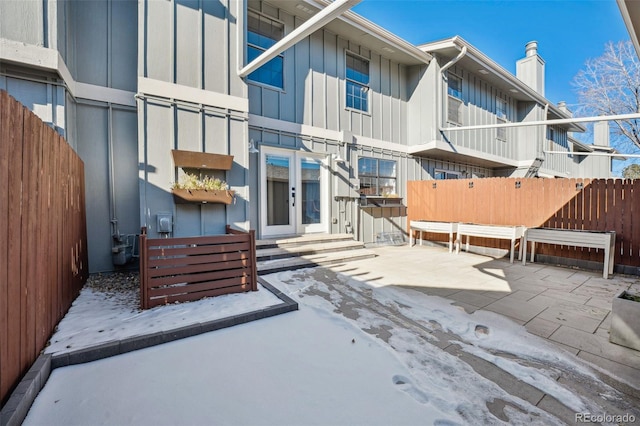 back of property featuring french doors and a patio area