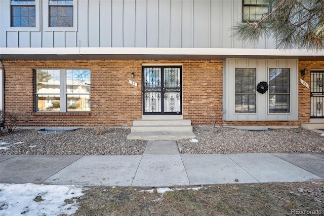 property entrance featuring french doors