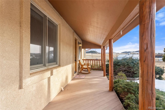 deck featuring covered porch