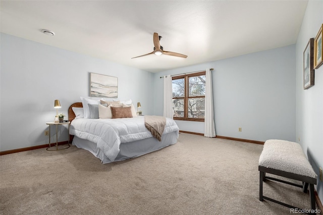 bedroom featuring a ceiling fan, baseboards, and carpet floors