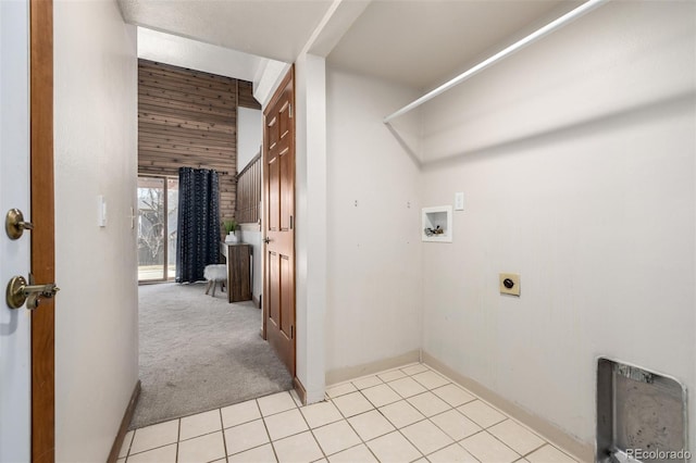 washroom featuring light colored carpet, washer hookup, light tile patterned floors, laundry area, and hookup for an electric dryer