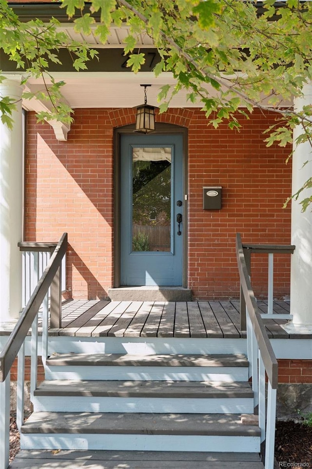 doorway to property with a porch