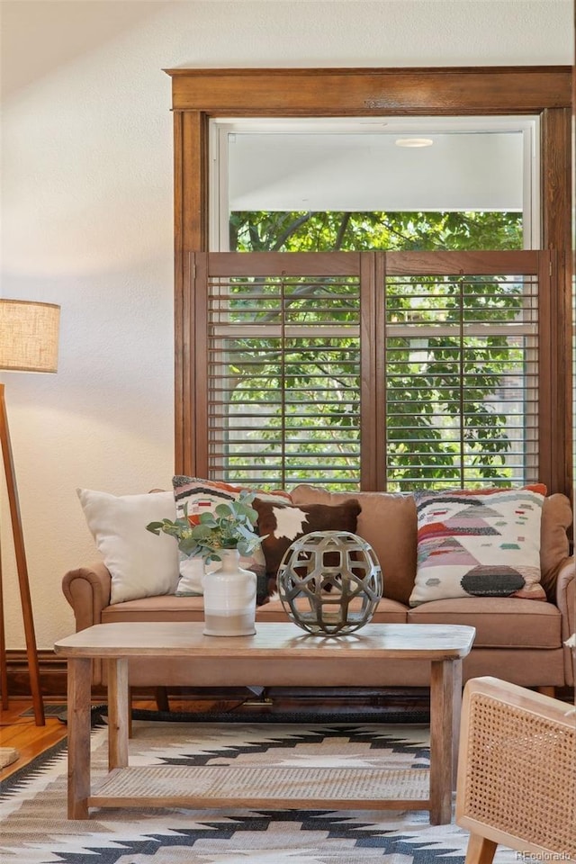 interior space with a wealth of natural light and wood-type flooring