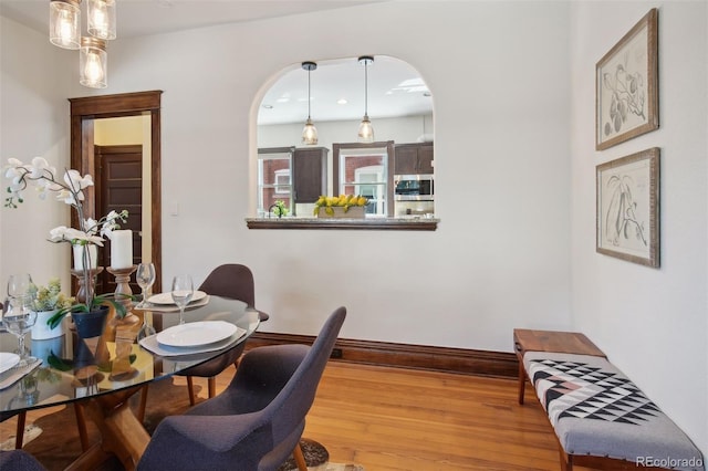 dining room with hardwood / wood-style flooring