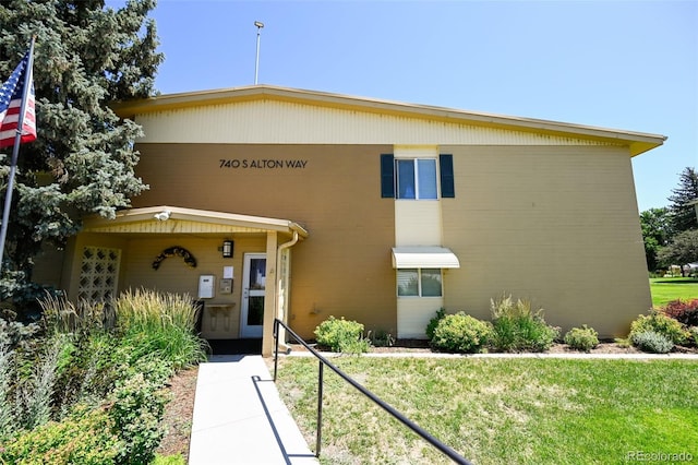 740 S Alton Way Unit 2A, Denver, CO 80247 - view of front of home with a front lawn