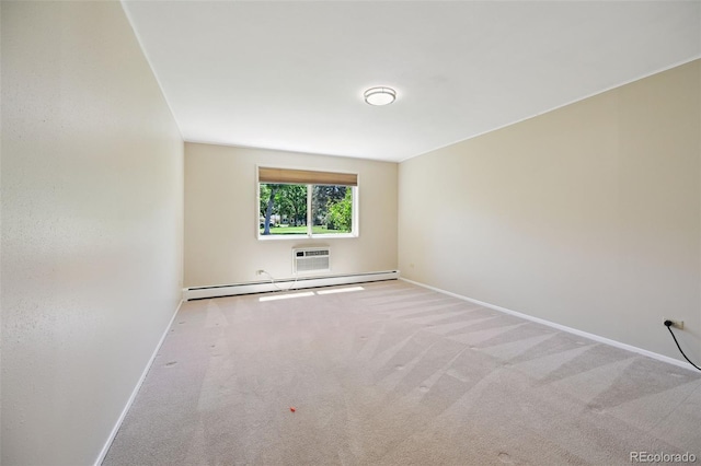 740 S Alton Way Unit 2A, Denver, CO 80247 - empty room featuring a baseboard radiator and carpet flooring