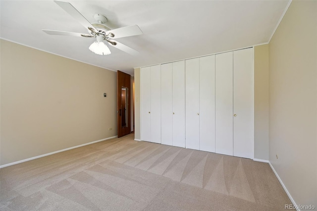 740 S Alton Way Unit 2A, Denver, CO 80247 - unfurnished bedroom with carpet flooring, a closet, and a ceiling fan