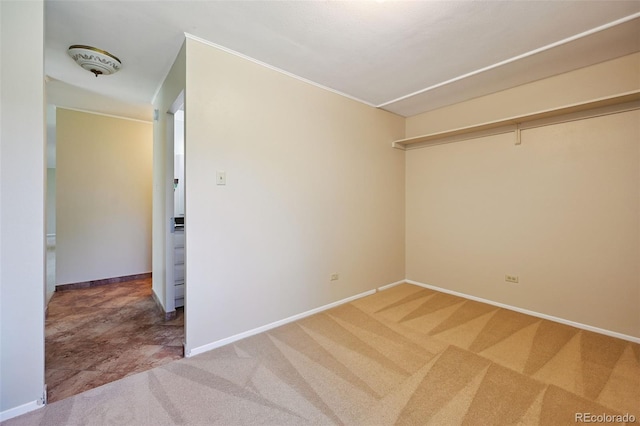 740 S Alton Way Unit 2A, Denver, CO 80247 - spare room featuring light carpet and baseboards