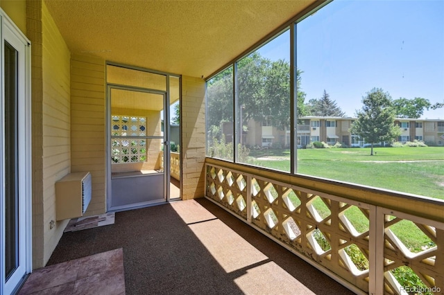 740 S Alton Way Unit 2A, Denver, CO 80247 - sunroom featuring a residential view