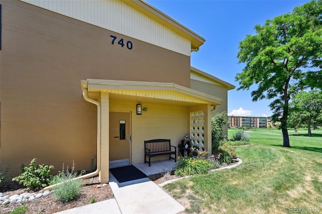 740 S Alton Way Unit 2A, Denver, CO 80247 - view of exterior entry with a lawn