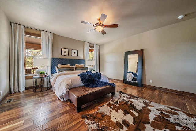8090 S Homesteader Dr, Morrison, CO 80465 - bedroom featuring wood finished floors and ceiling fan