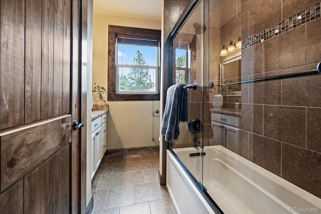 8090 S Homesteader Dr, Morrison, CO 80465 - bathroom with vanity, stone tile flooring, and enclosed tub / shower combo