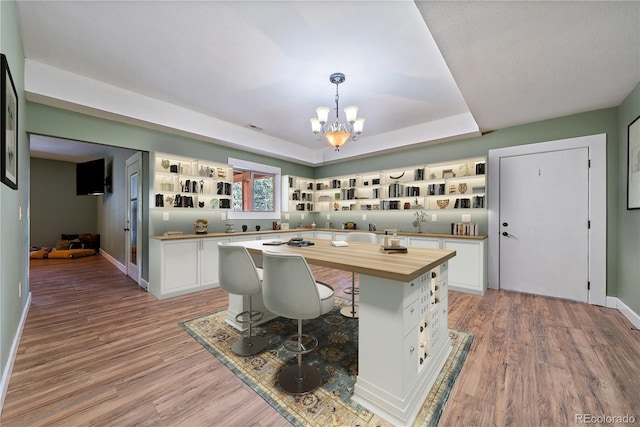 8090 S Homesteader Dr, Morrison, CO 80465 - office with a chandelier and light wood finished floors
