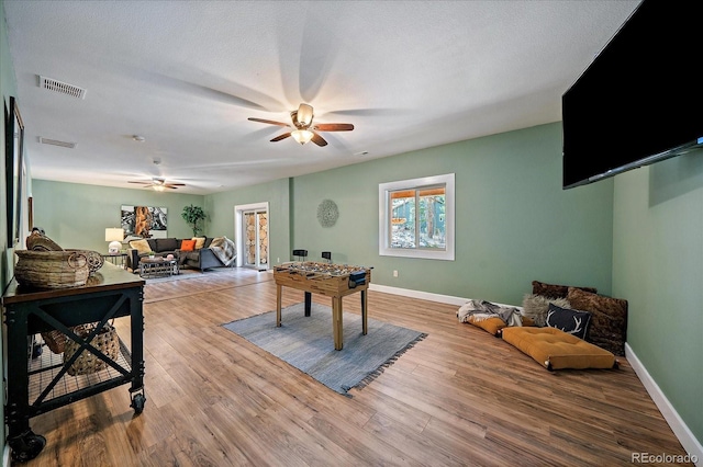 8090 S Homesteader Dr, Morrison, CO 80465 - game room with ceiling fan and wood finished floors
