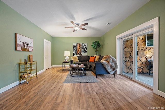 8090 S Homesteader Dr, Morrison, CO 80465 - living area featuring ceiling fan and wood finished floors