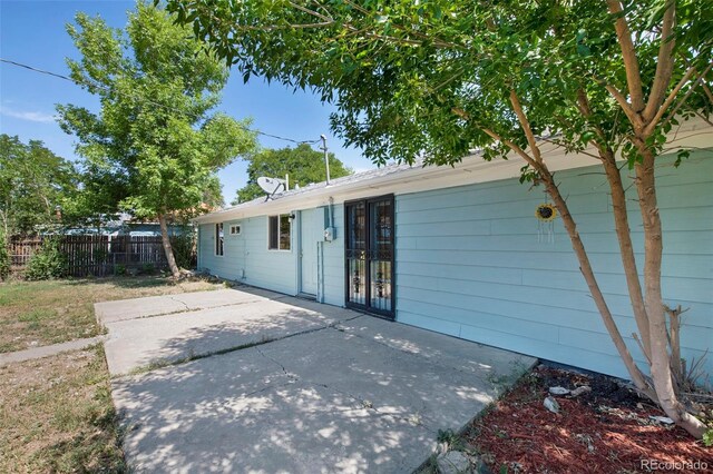 view of front of house featuring french doors and a patio area