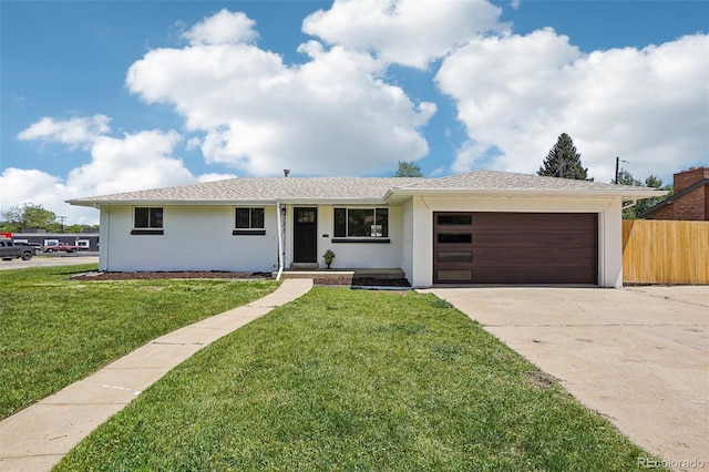 6068 Lee St, Arvada, CO 80004 - ranch-style home featuring an attached garage and driveway