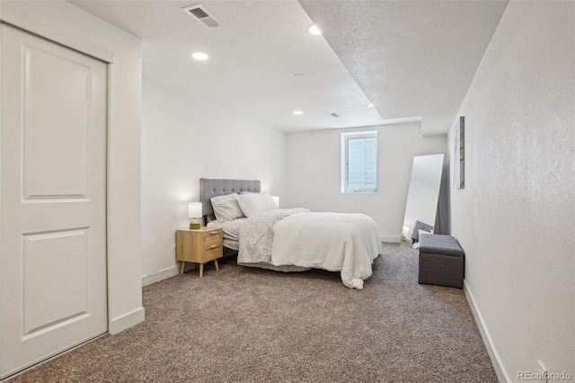 6068 Lee St, Arvada, CO 80004 - bedroom featuring carpet floors, baseboards, recessed lighting, and a textured ceiling
