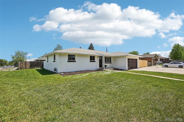 6068 Lee St, Arvada, CO 80004 - single story home with an attached garage and concrete driveway