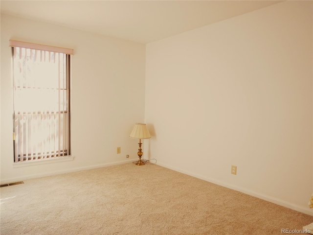 view of carpeted spare room