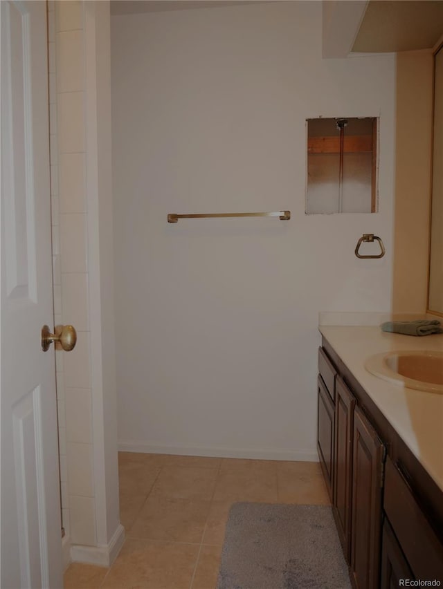 bathroom with vanity and tile patterned floors