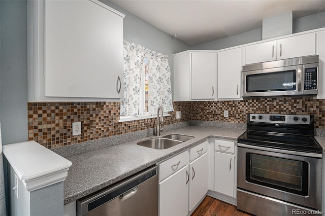 kitchen with white cabinetry, sink, and appliances with stainless steel finishes