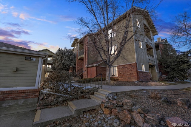 view of property exterior at dusk