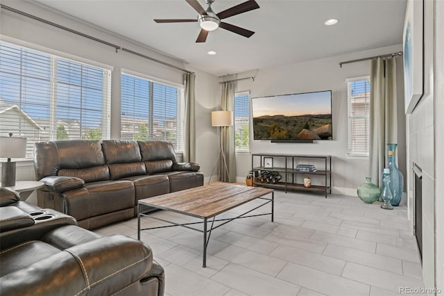 7380 S Shady Grove Way, Aurora, CO 80016 - living room with ceiling fan, baseboards, healthy amount of natural light, and recessed lighting