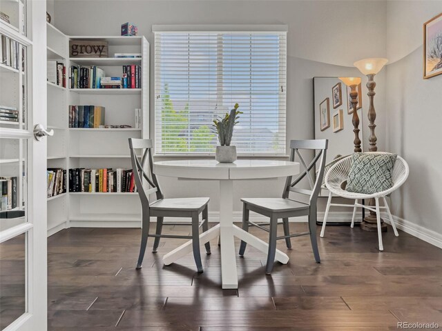 7380 S Shady Grove Way, Aurora, CO 80016 - dining room featuring baseboards and dark wood-style flooring