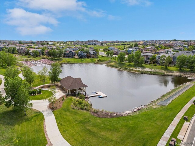 7380 S Shady Grove Way, Aurora, CO 80016 - aerial perspective of suburban area with a nearby body of water