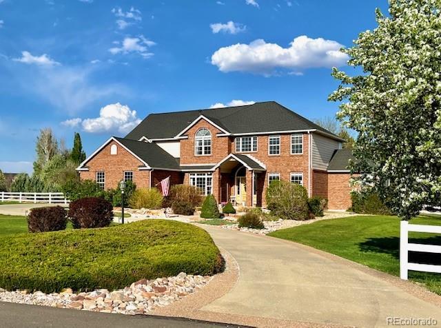 view of front of home with a front yard