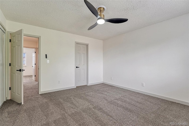 unfurnished bedroom featuring carpet flooring, ceiling fan, and a textured ceiling