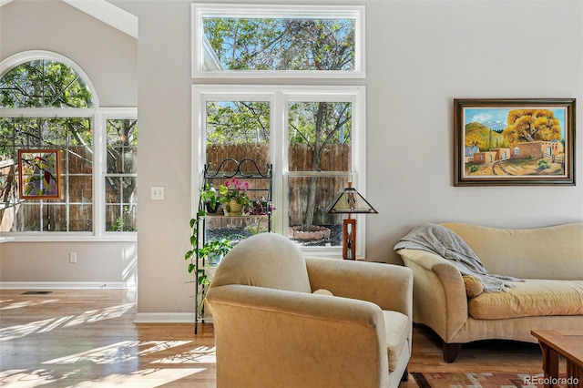 2252 S Yosemite Cir, Denver, CO 80231 - sitting room featuring baseboards and wood finished floors