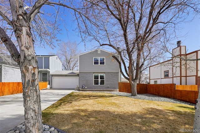 view of front facade featuring a garage, driveway, brick siding, and fence