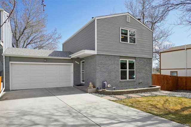 view of front of property featuring driveway, brick siding, an attached garage, and fence