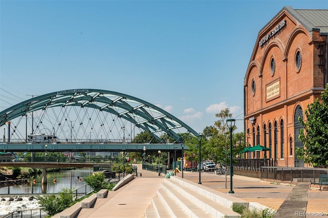 view of home's community with a water view