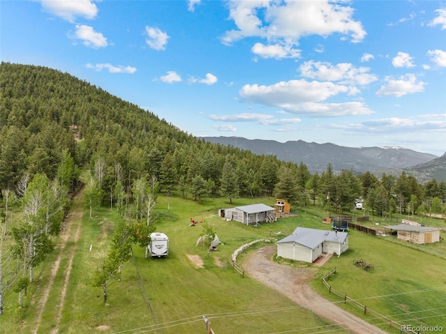 bird's eye view with a mountain view and a rural view