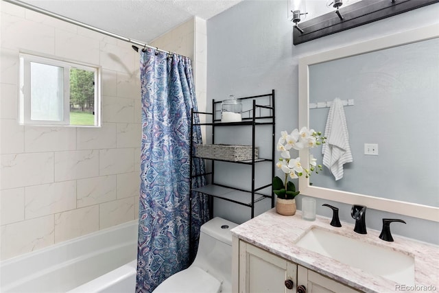 full bathroom featuring shower / bath combination with curtain, toilet, a textured ceiling, and vanity