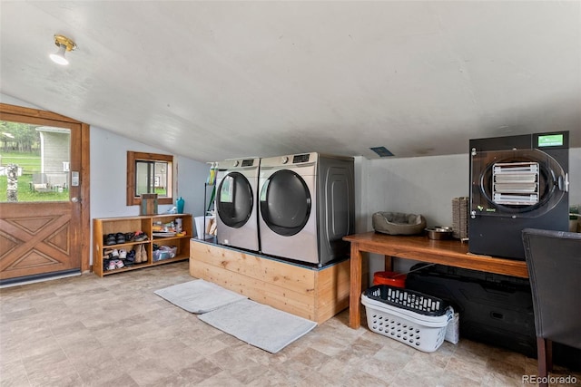 washroom featuring washer and dryer