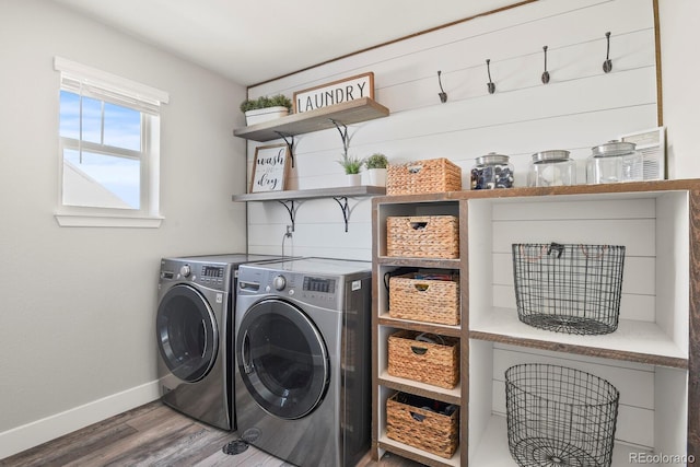 6654 Backcountry Loop, Colorado Springs, CO 80927 - washroom featuring baseboards, wood finished floors, and washing machine and clothes dryer