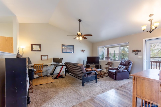 132 Windwalker Rd, Buena Vista, CO 81211 - living area featuring ceiling fan with notable chandelier, wood finished floors, and lofted ceiling
