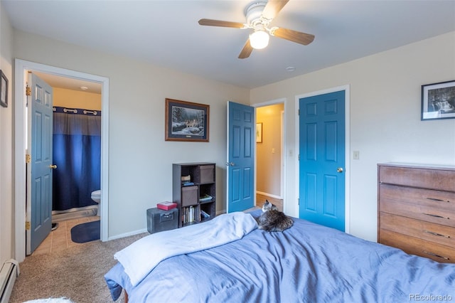 132 Windwalker Rd, Buena Vista, CO 81211 - bedroom with ensuite bath, carpet floors, a ceiling fan, baseboards, and a baseboard radiator