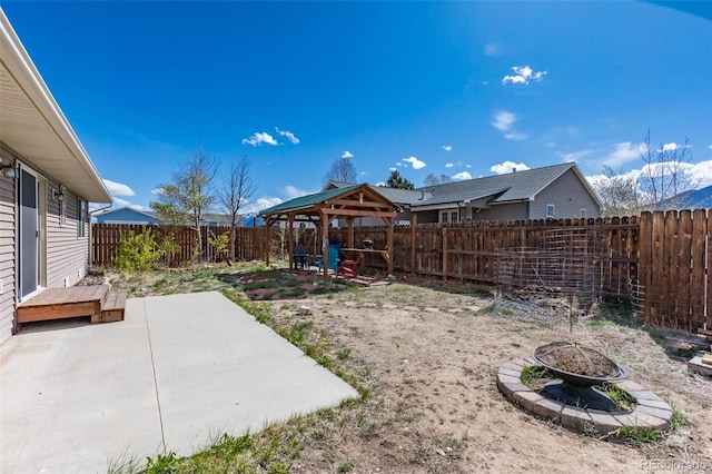 132 Windwalker Rd, Buena Vista, CO 81211 - view of yard with a fenced backyard, a patio, a gazebo, and a fire pit