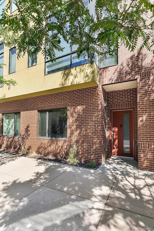 2335 Walnut St Unit 10, Denver, CO 80205 - property entrance featuring brick siding