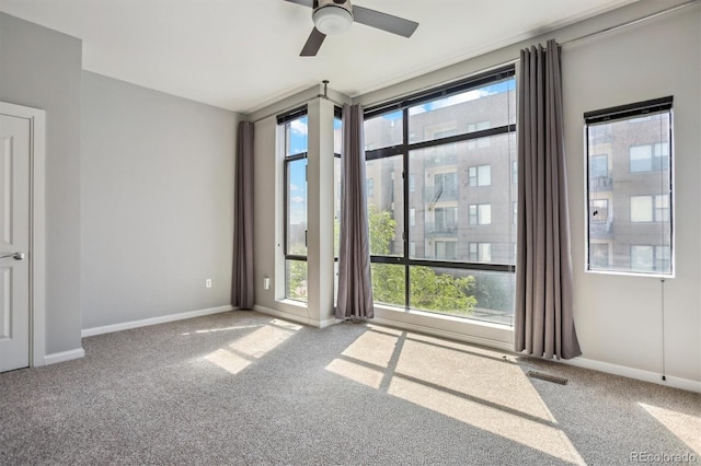 2335 Walnut St Unit 10, Denver, CO 80205 - unfurnished room with carpet flooring and ceiling fan