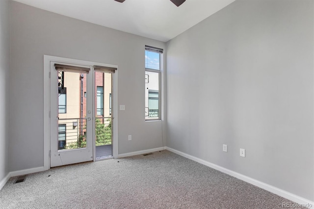 2335 Walnut St Unit 10, Denver, CO 80205 - carpeted spare room featuring ceiling fan and plenty of natural light