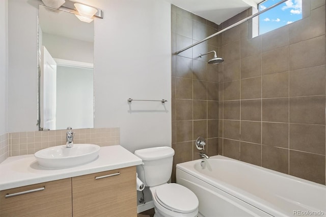 2335 Walnut St Unit 10, Denver, CO 80205 - full bath featuring vanity, tasteful backsplash, and tub / shower combination