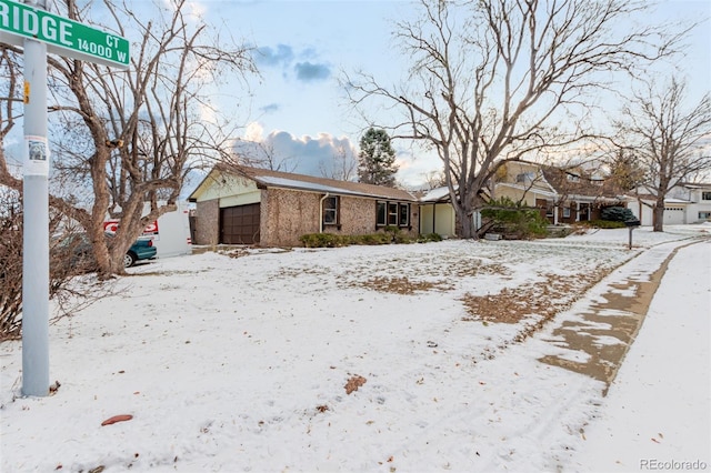 view of front of property featuring a garage